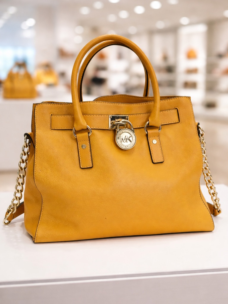 Michael Kors Yellow Leather Satchel With Gold Chain And Logo Charm
